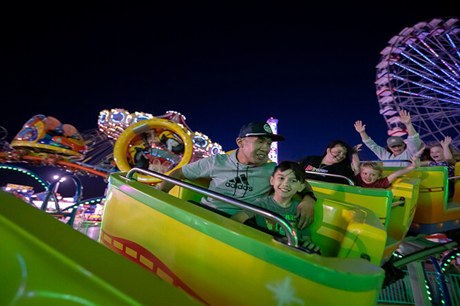 Riders on Hot Tamales at night