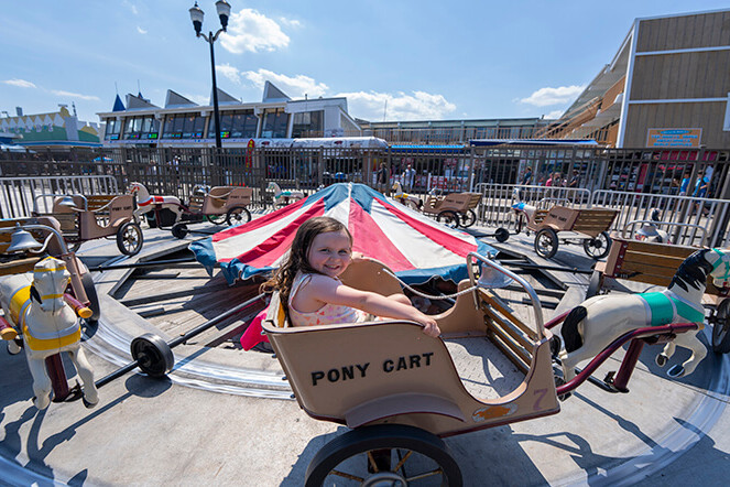 Child riding the Pony Carts