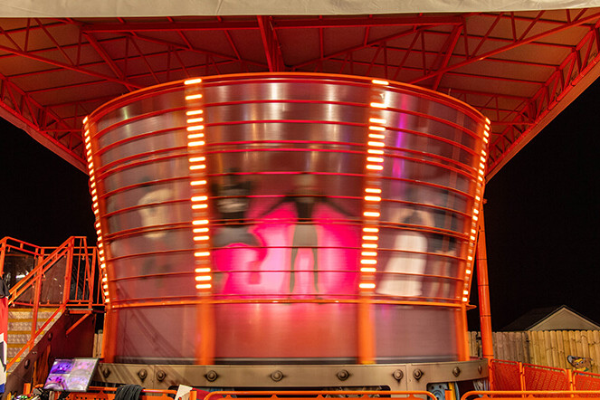 Zero Gravity ride lit up at night
