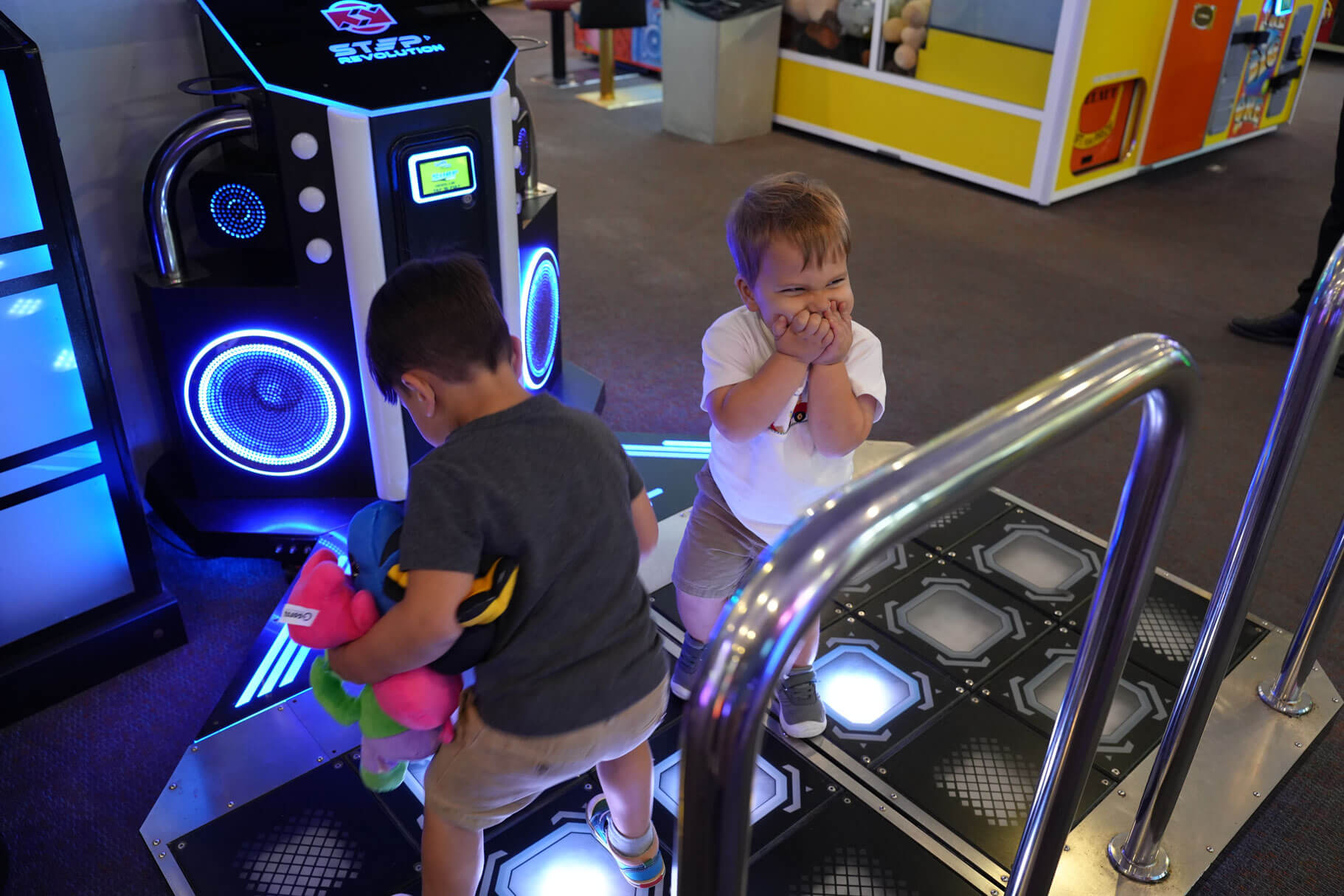 Kids playing games at a Casino Arcade party