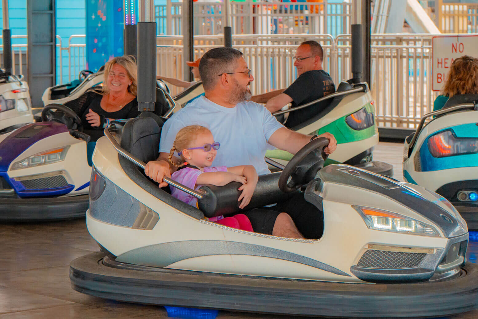 Family driving a Bumper Car