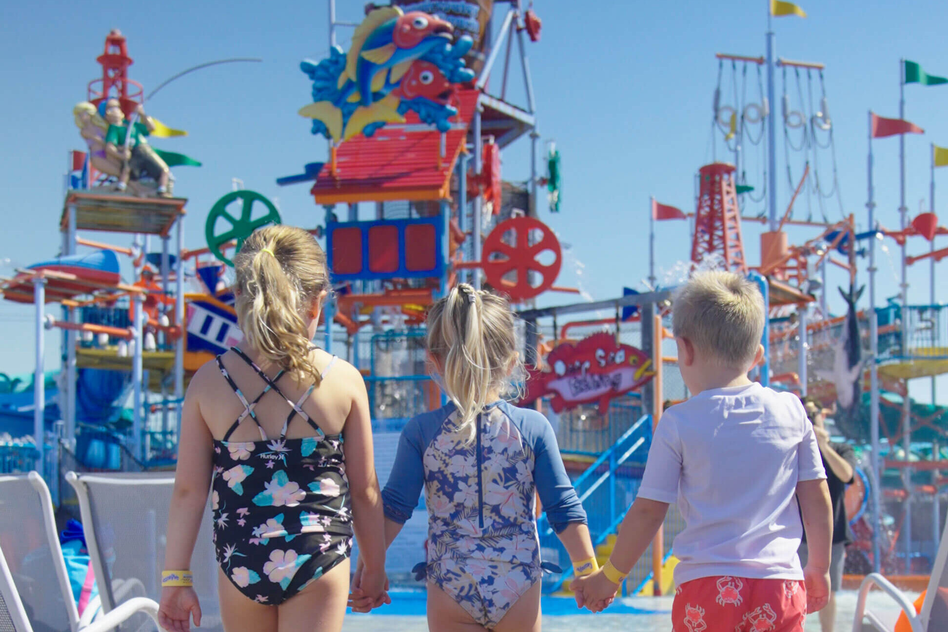 Kids heading into Breakwater Beach