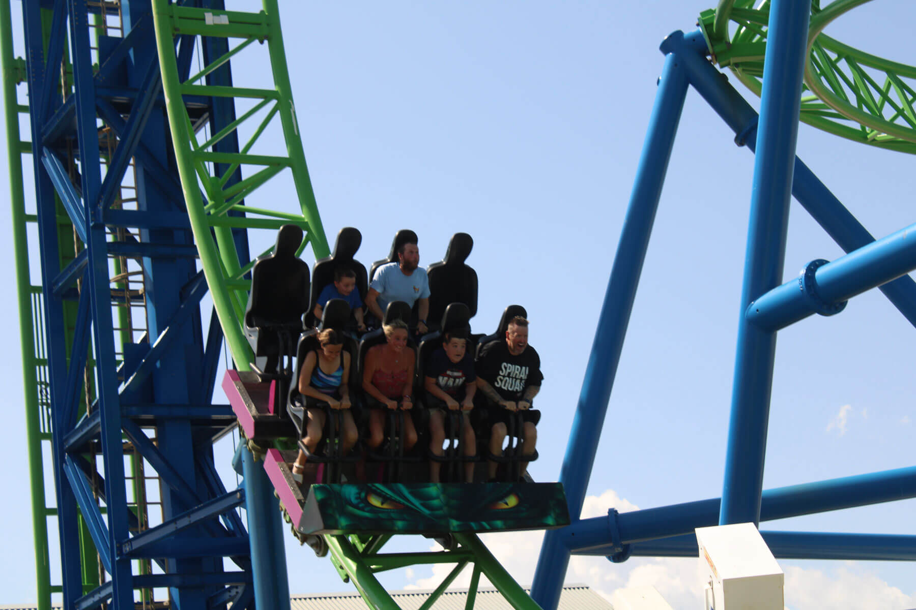 Riders on the Hydrus roller coaster