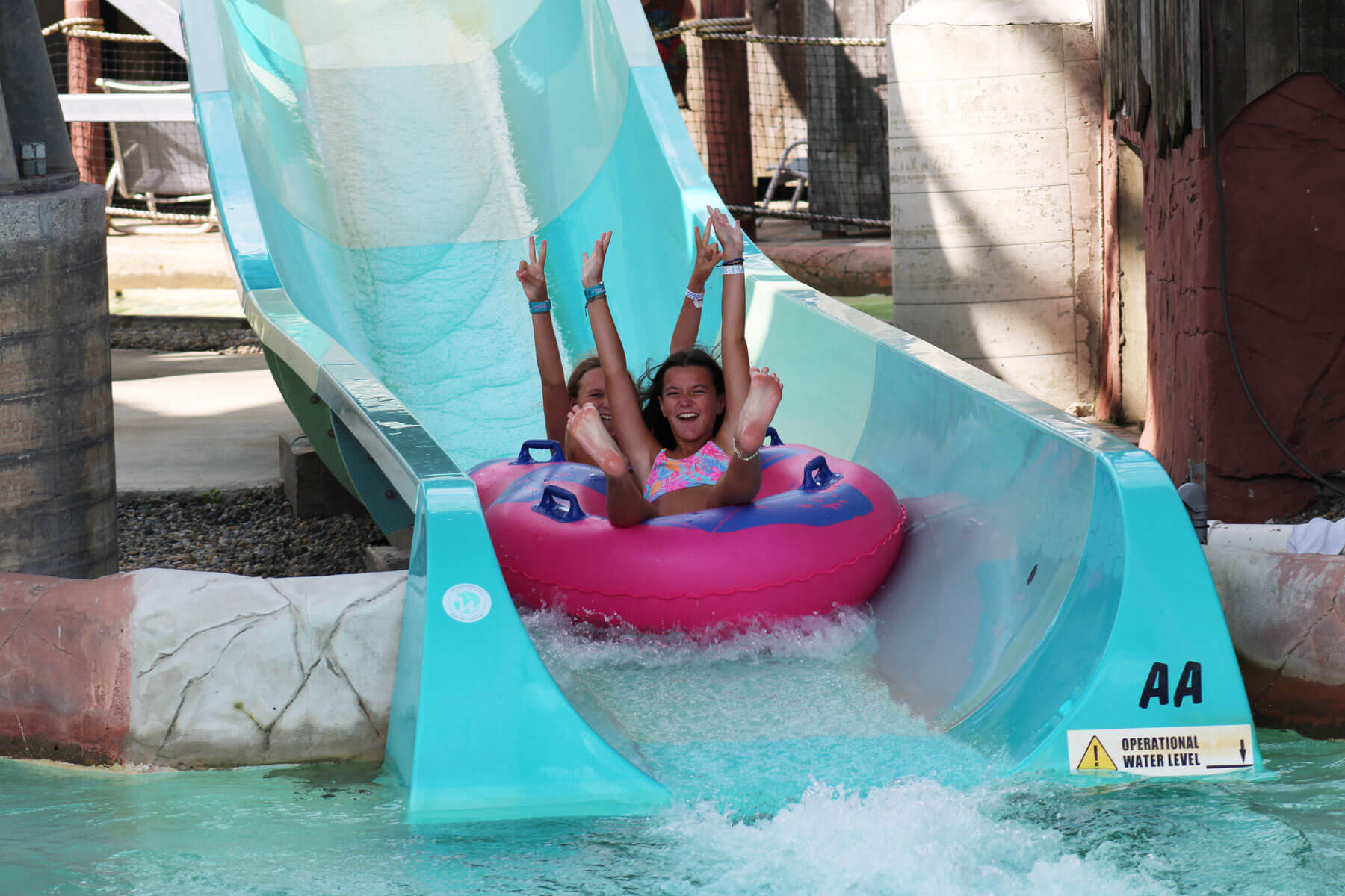 Riders on the Lexington tube slide at Boston Sea Party