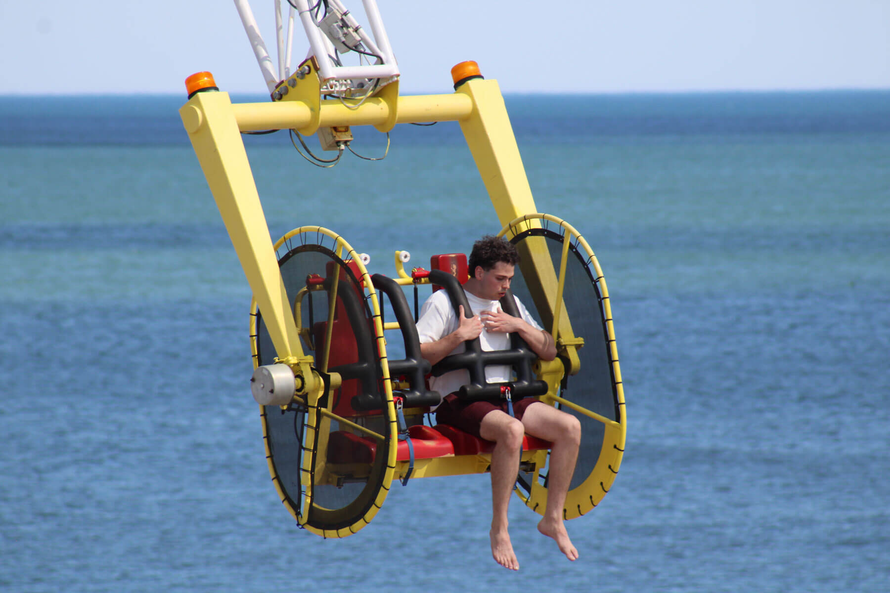 Riders on the Skyscraper over the ocean