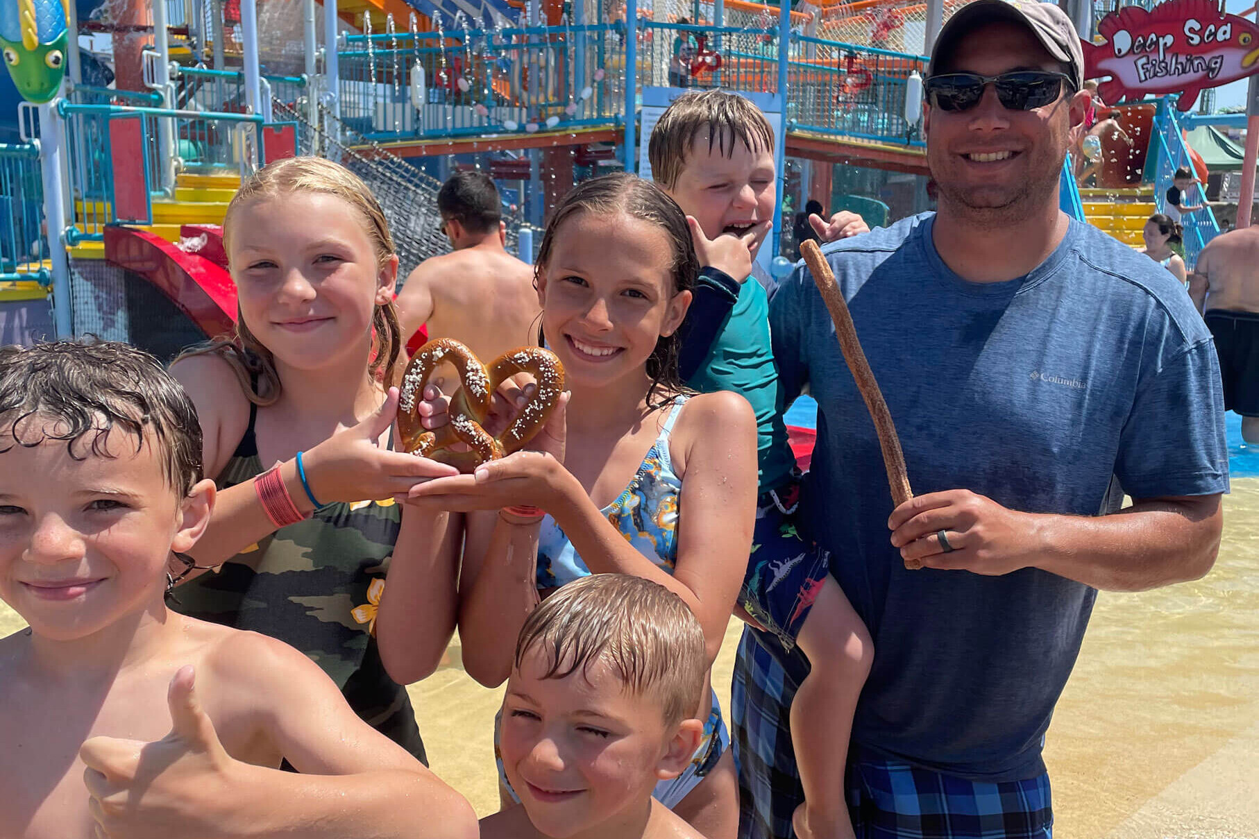 Family with treats from The Cottage at Breakwater Beach