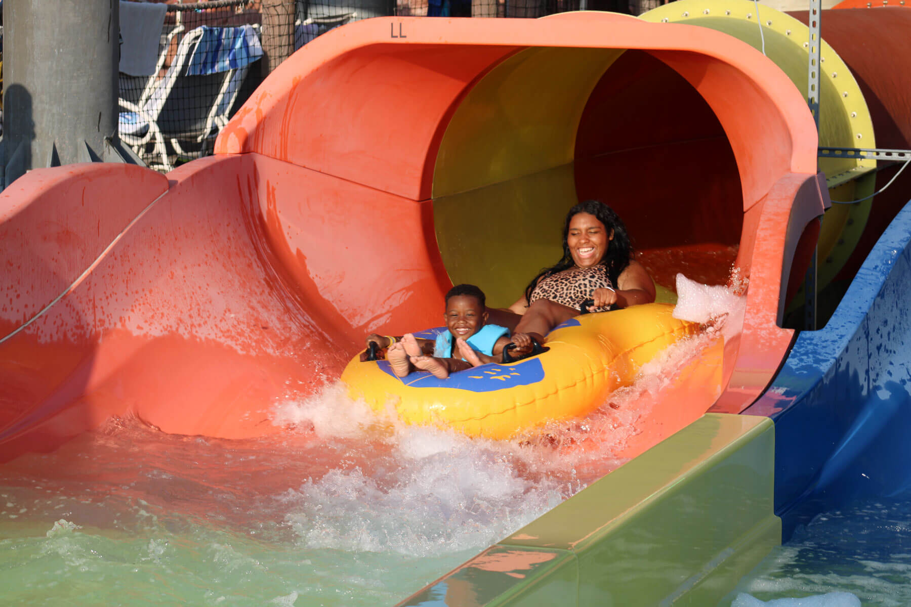Riders on the Freedom Flume enclosed tube slide